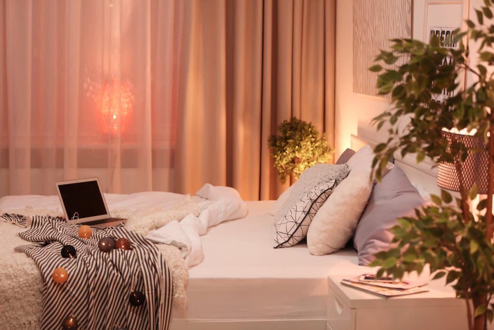 bedroom with beautiful decorative lighting to set the mood