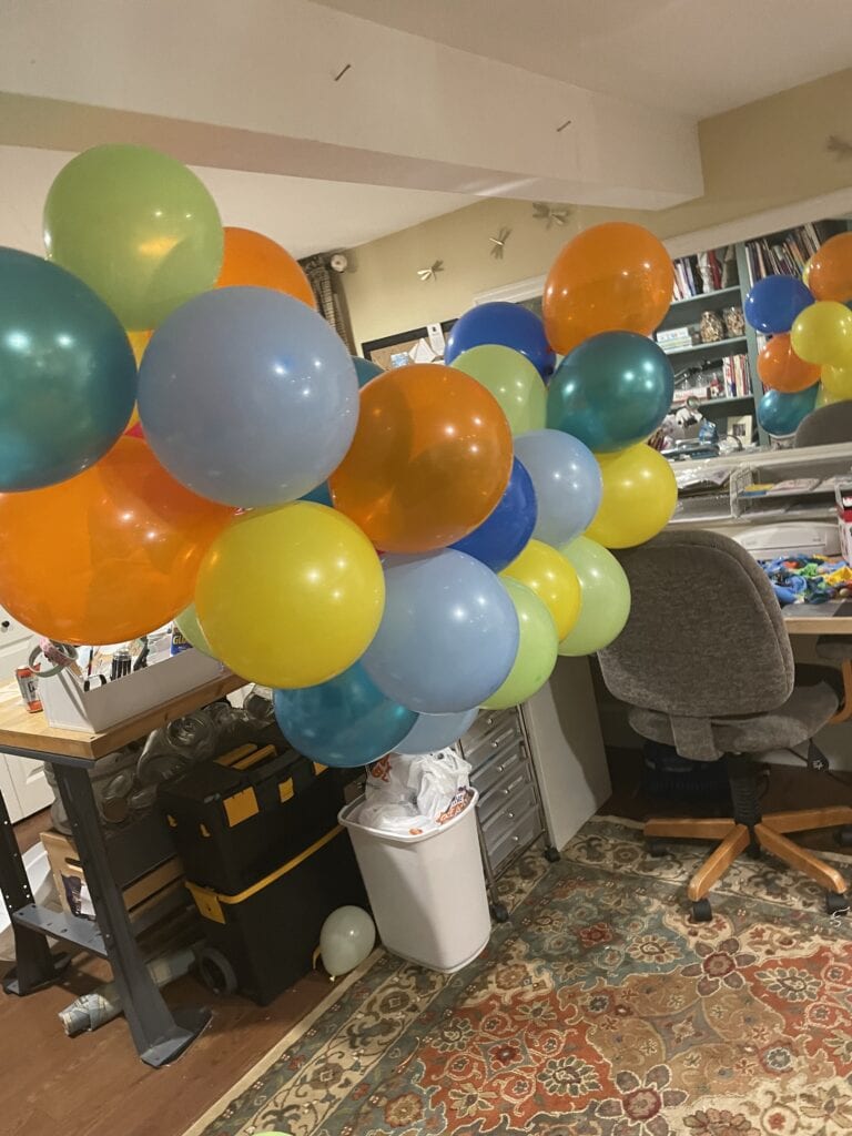 Balloon arch for a garden themed baby shower