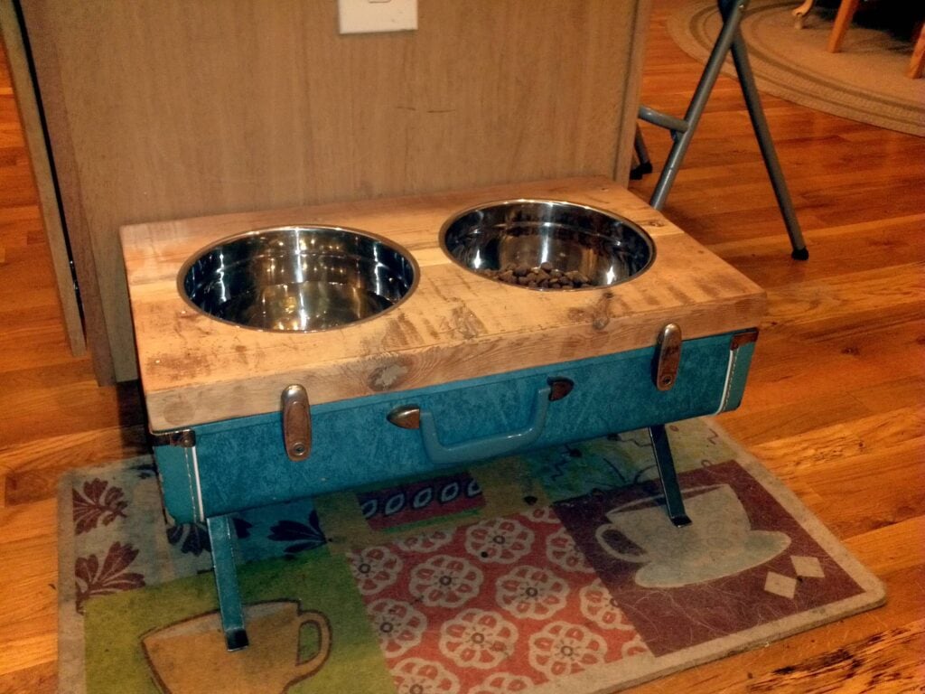 pet food bowls made from a vintage suitcase